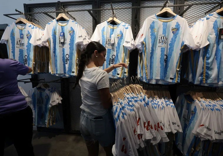 The new shirts were put on display at the club shop on Friday.