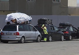 Cars queue up to cross the Strait towards Morocco.