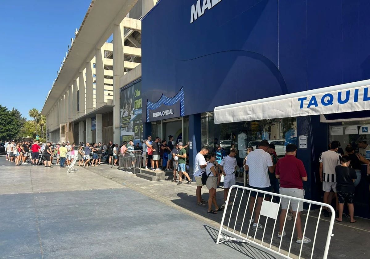 Fans queuing at the ticket offices outside La Rosaleda.