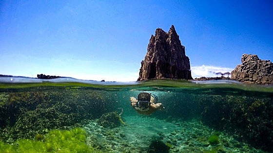 The island on the south coast of Spain where mermaids live