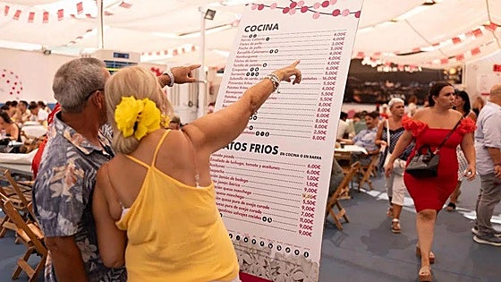 Complaints about price hikes at Malaga's annual summer fair fail to dampen the party spirit for everyone