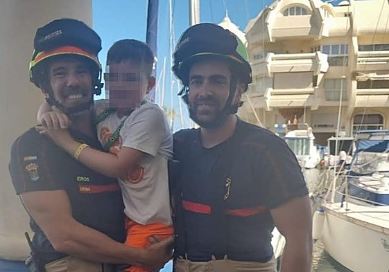 Jacob hugs his rescuers.