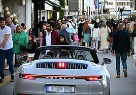 A luxury car cruising around Puerto Banús (Marbella).