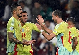 Spain's national team players celebrate one of the four goals scored