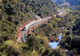 A view of the railway line that runs parallel to the snaking Guadiaro river.