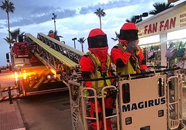 Firefighters in their protective gear during the call-out in Los Boliches.