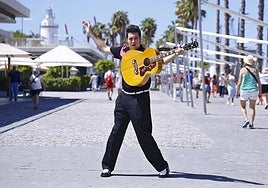 The Elvis of Malaga. Ángel David Castillo poses dressed as the King at Muelle Uno.