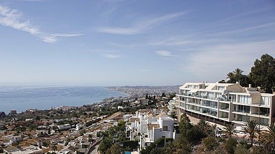Which parts of Benalmádena are under pressure due to high percentage of holiday rental properties?