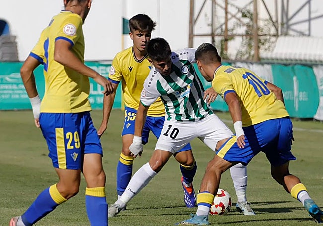 Fran Castillo, of Torremolinos, is outnumbered.