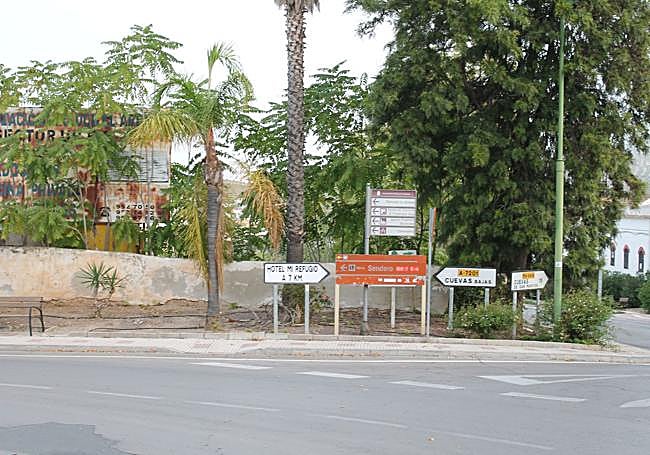 Signs located at the end of Granada Street, on the way out of the village.