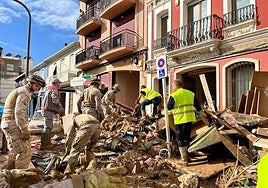 Army teams at work in one of the disaster areas in Valencia.