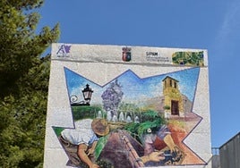 The UN Sipam sign welcoming people to Almáchar.