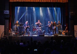 The group on stage in Seville.