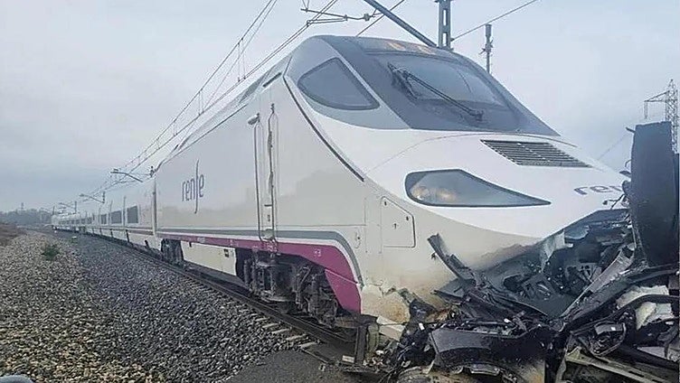 Two railway workers killed after train runs over vehicle in northern Spain