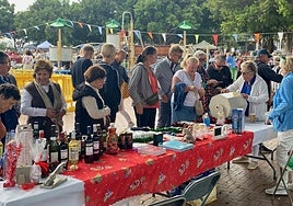 Visitors enjoy the market stalls.