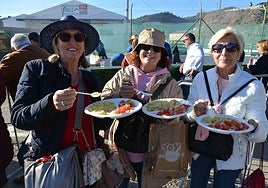 Visitors sample migas with ensalada arriera in 2023