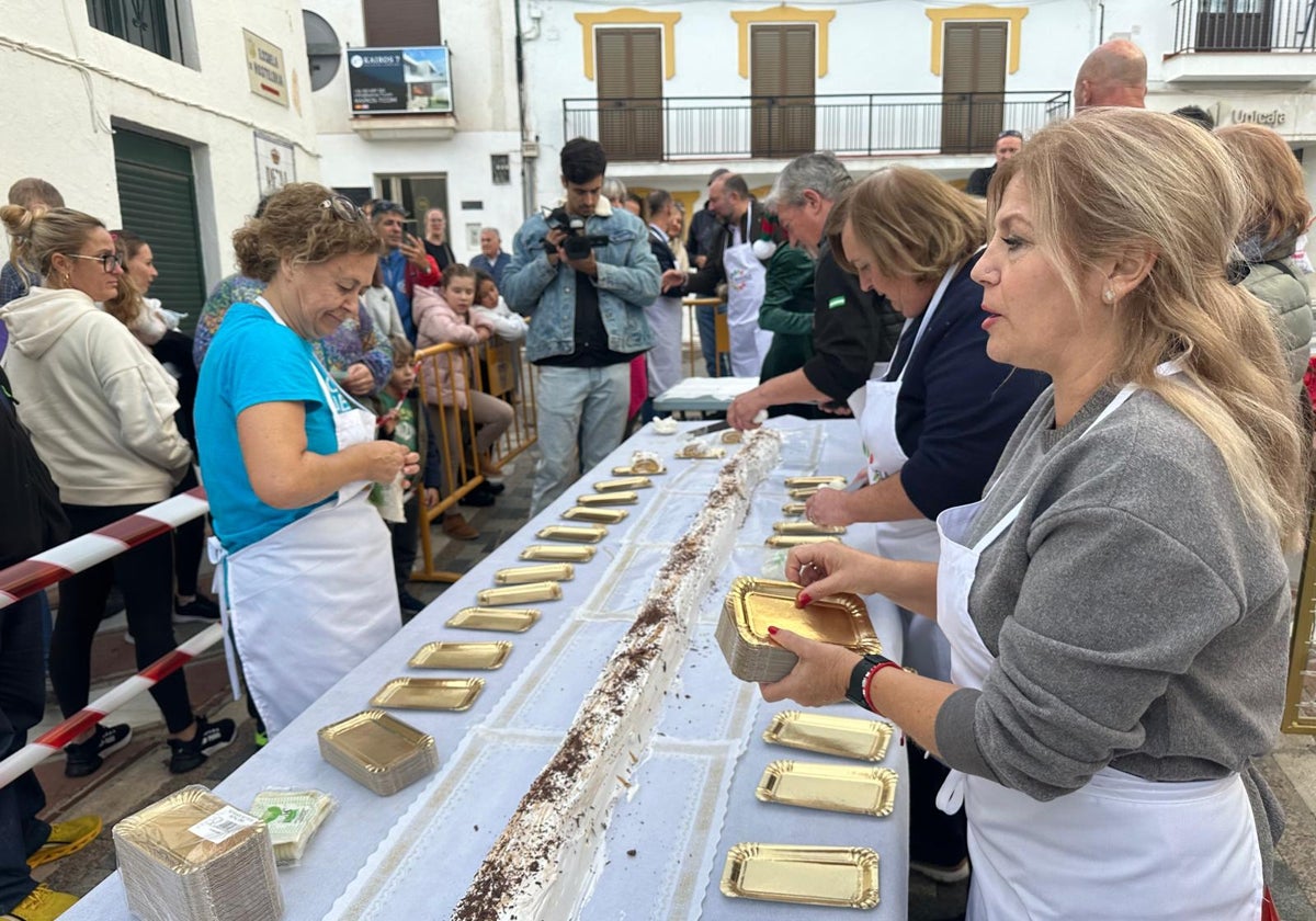 Portions of the Yule log cake are sold to benefit two charities.