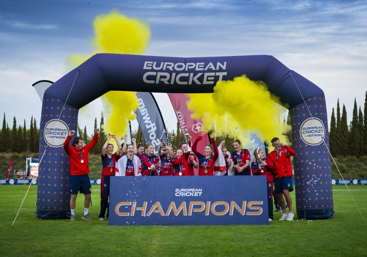 The Jersey players celebrate with the trophy following their Challenger final win over Germany.