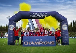 The Jersey players celebrate with the trophy following their Challenger final win over Germany.