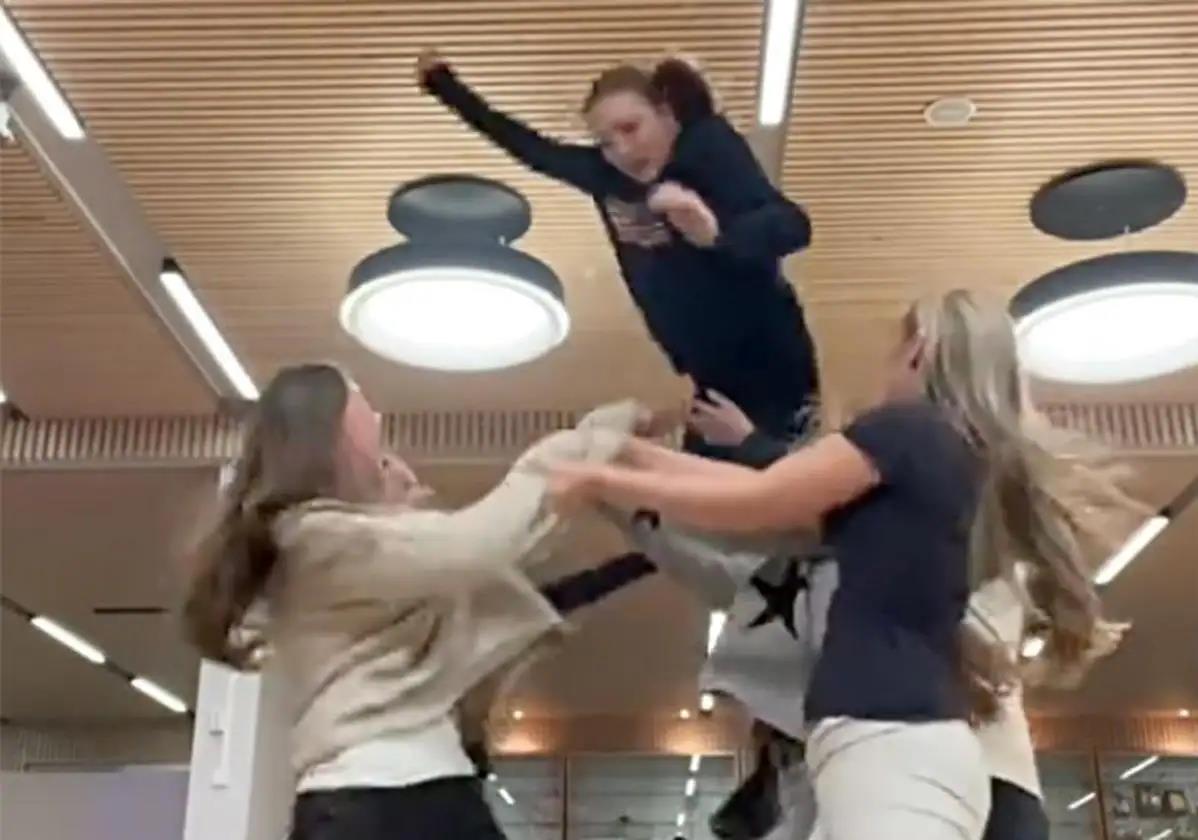 Young girls attempt the 'Superman Challenge'.