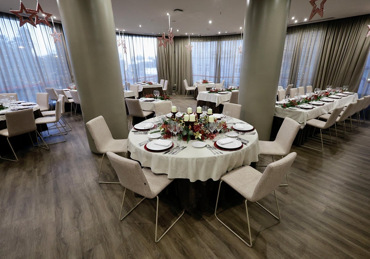 Tables are set with festive decorations ready for more celebrations at the AC Hotel Málaga Palacio in Malaga city.