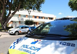Fuengirola Local Police vehicles in front of the force's headquarters.