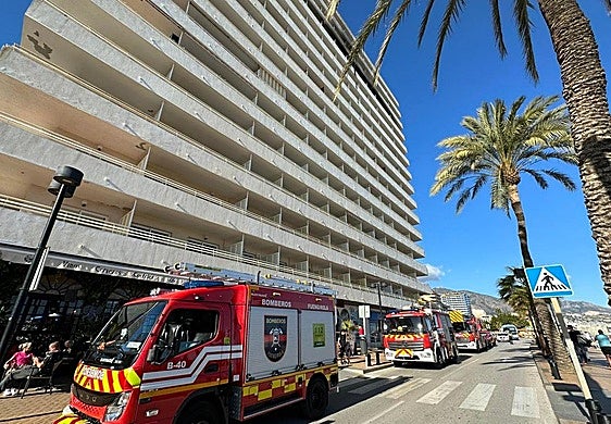 Firefighters in front of the Stella Maris building in Fuengirola.
