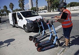 File photo of electric scooters for rent in Malaga.