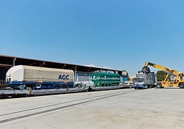 Image of a truck loading operation on a train.
