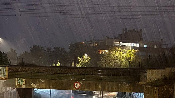 Trapped driver rescued from car in flooded underpass in Benalmádena