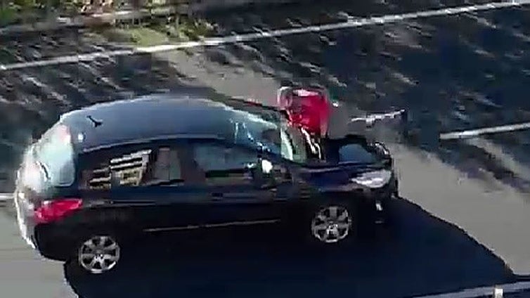 Driver travels 200 metres with a man on the bonnet of his car after traffic row in Spain