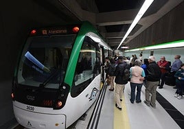File image of passengers at a Malaga city metro station.