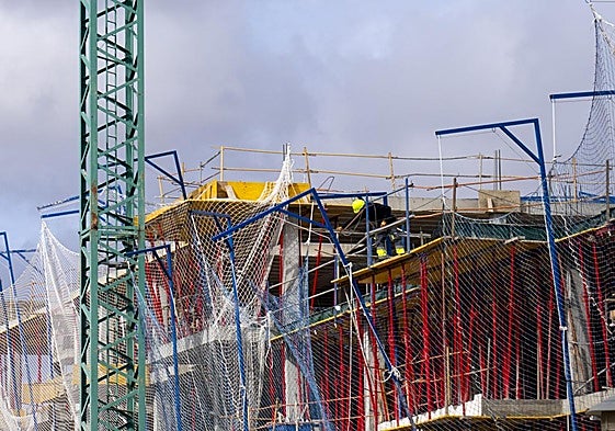 Construction workers on a building site in Teruel.