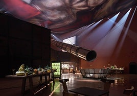 The building combines a museum with olive oil production. Olives drop down the chute in the photo to the lower floor for milling.