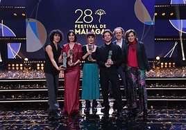 The team behind Sorda with their awards at the Cervantes theatre.