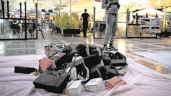 Would you pay 1,000 euros for a fake designer brand bag?