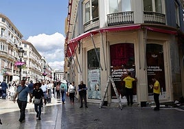 Decorative vinyls are placed on the front of the establishment.