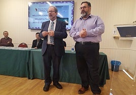 John Cortes (r) and Manuel Enriles (l) presenting the book.