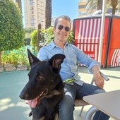 Felipe Sánchez sitting next to his dog, now renamed Tano.