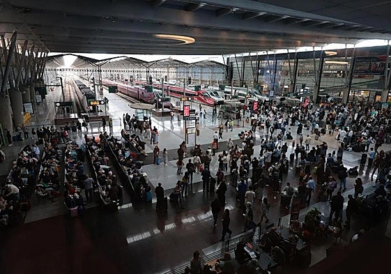 Passengers waiting for trains at María Zambrano station in Malaga city this Monday morning.