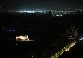 File image of Malaga city centre in the dark.