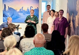 The group performing to local residents in Riogordo.