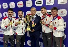 Balbuena, right, with the rest of the winning team.