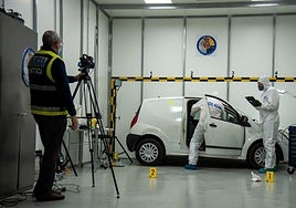 Police collecting evidence and searching for DNA.