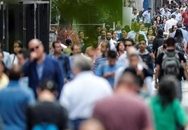 People strolling through Malaga.