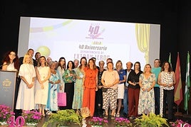 Award winners with Mijas foreigners department and local councillors at the anniversary gala.