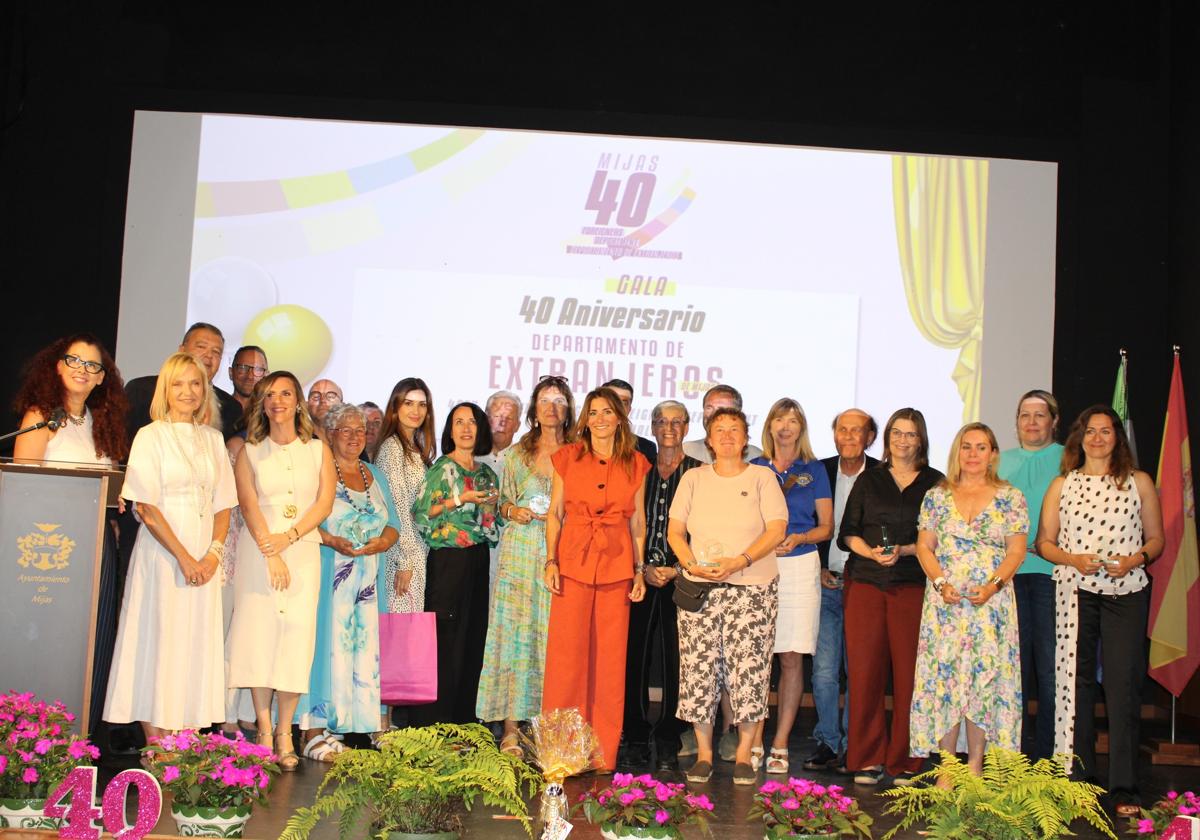 Award winners with Mijas foreigners department and local councillors at the anniversary gala.