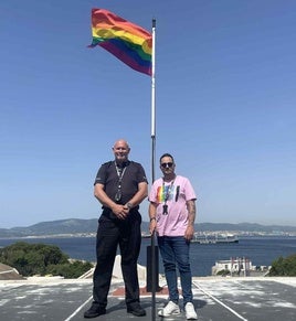Police Constable Jason Russell and Raygan Martinez-Gaivizo at the flag raidsing ceremony.