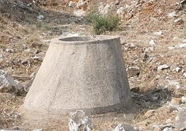 The rainwater tank where the bag with the skull was found.