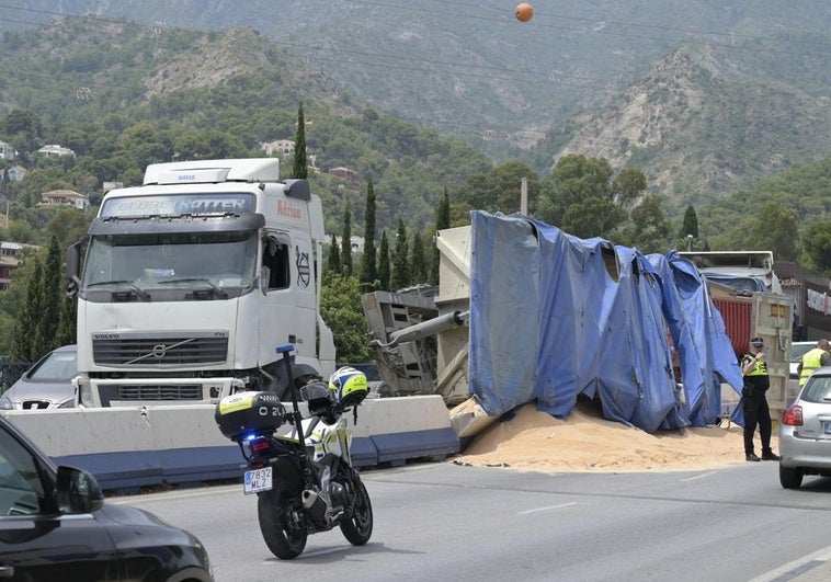 Chaos on the Costa as lorry loaded with sand overturns on one of the key access roads to Marbella